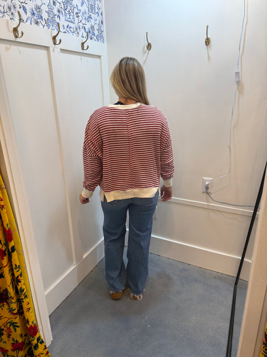 STRIPE EXPOSED SEAM SPLIT HEM LONG SLEEVE KNIT TOP