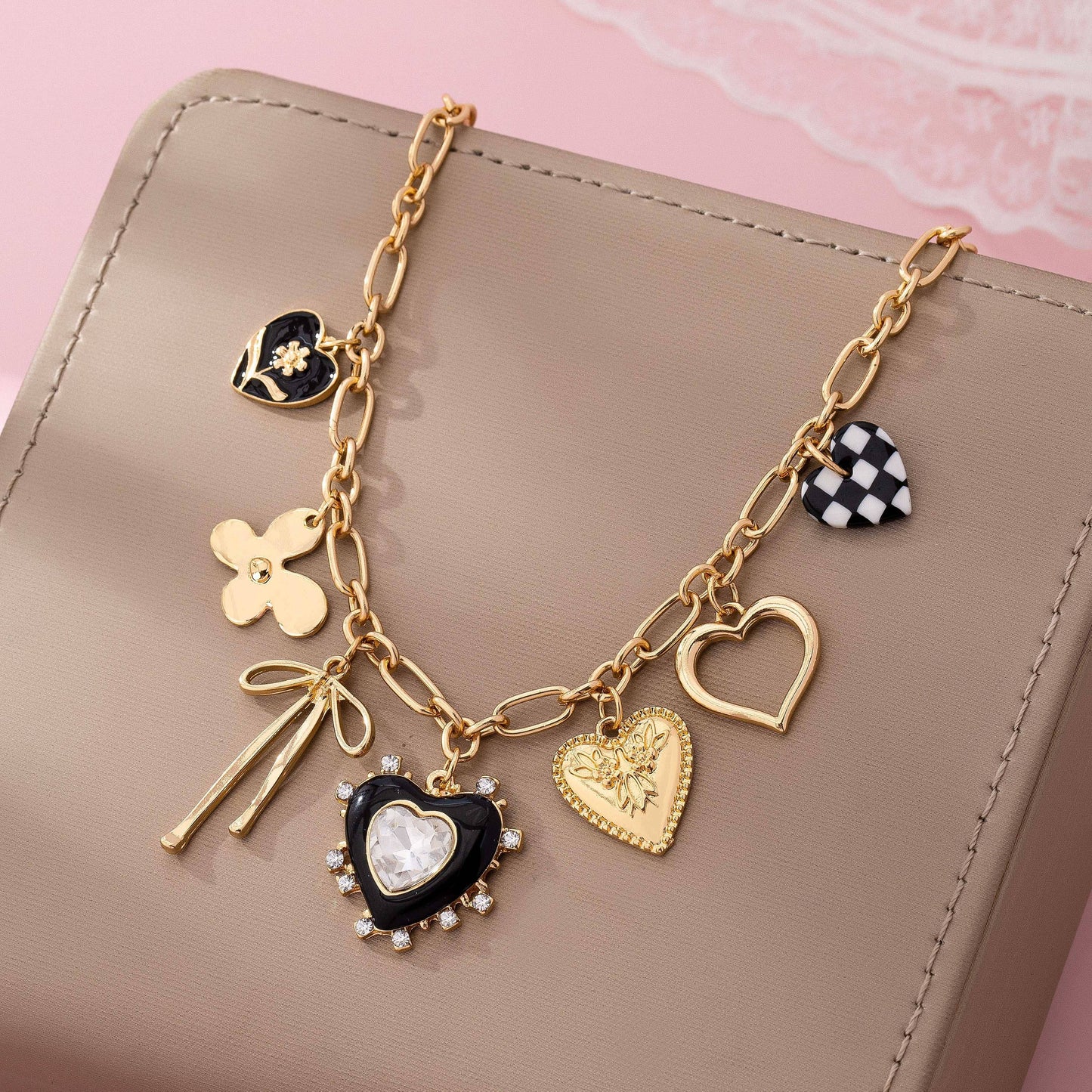 CHARM NECKLACE-BOW CHECKER HEART RHINESTONE