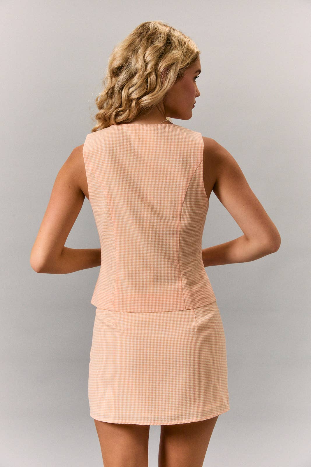ROUND NECKLINE TOP WITH BUTTON UP FASTENING WITH MINI SKIRT (Sold as Separates)