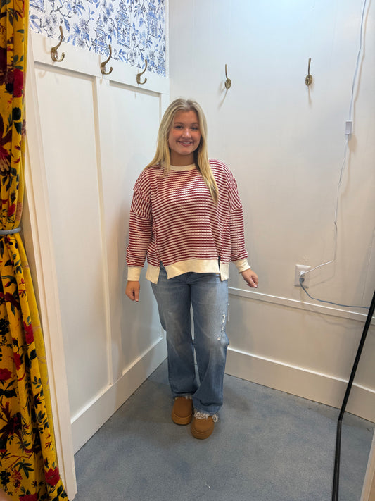 STRIPE EXPOSED SEAM SPLIT HEM LONG SLEEVE KNIT TOP