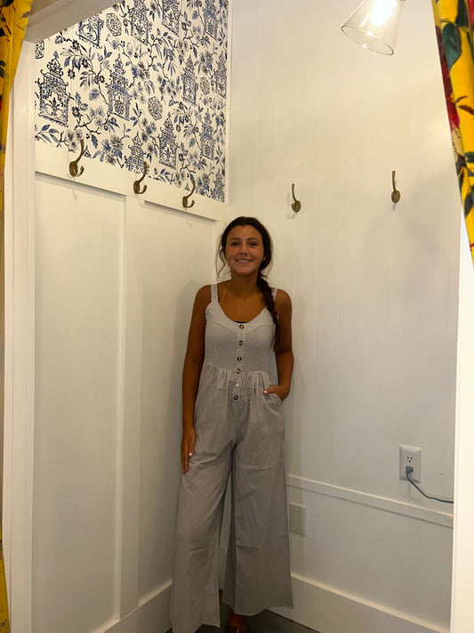 Half Buttoned Sleeveless Wide Leg Jumpsuit