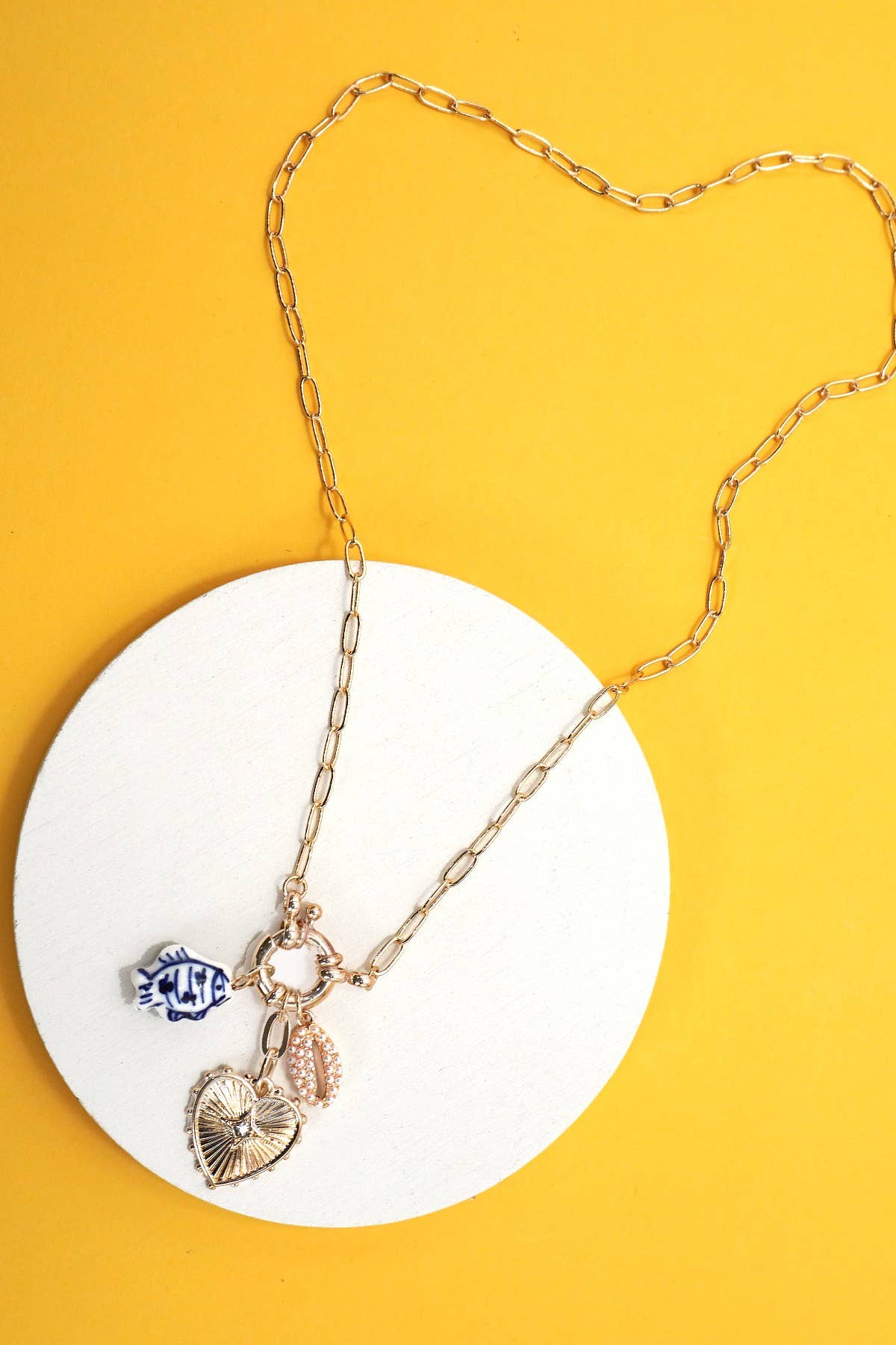 PORCELAIN TOILE FISH PUKA MULTI CHARM NECKLACE