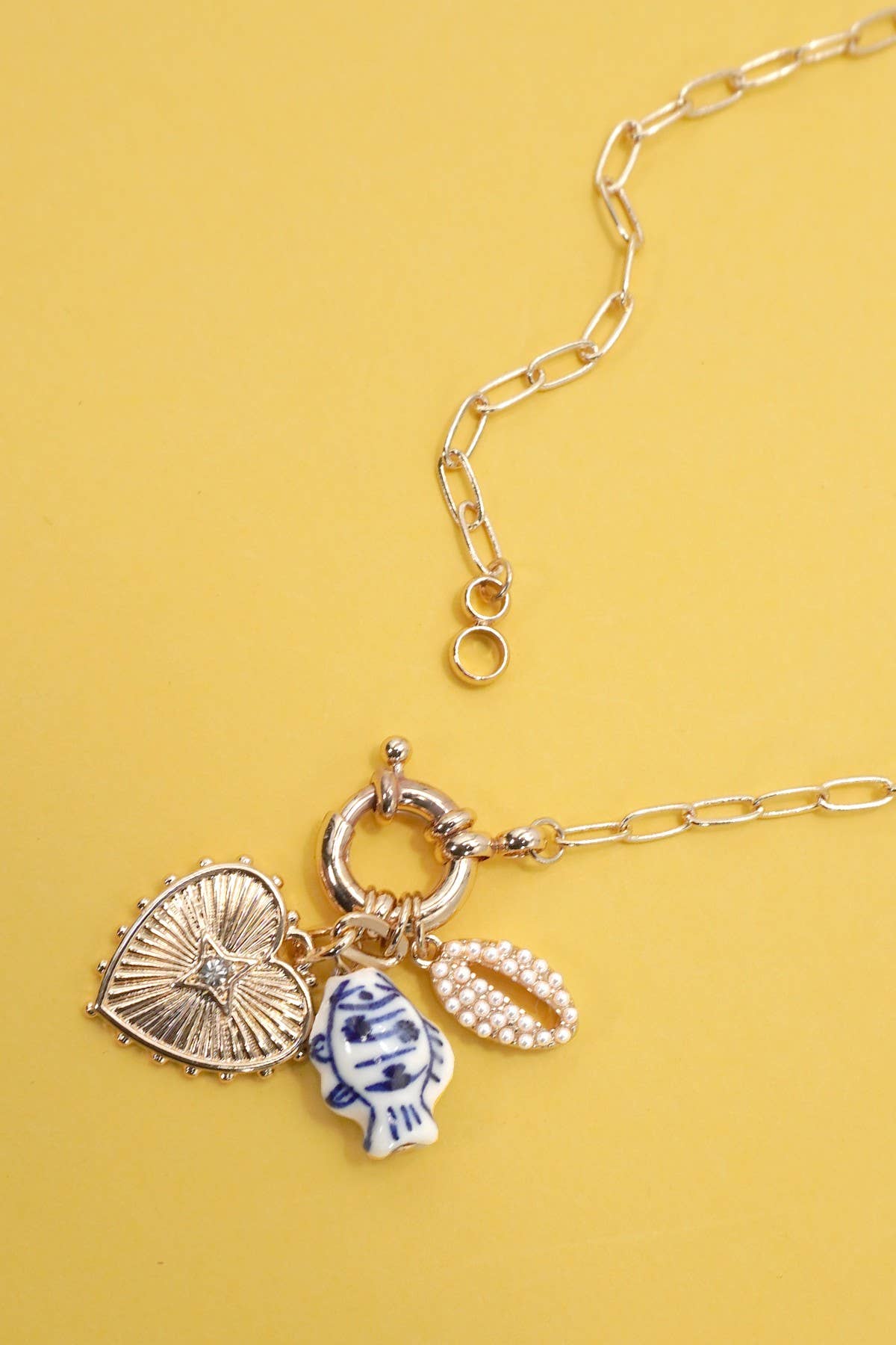 PORCELAIN TOILE FISH PUKA MULTI CHARM NECKLACE