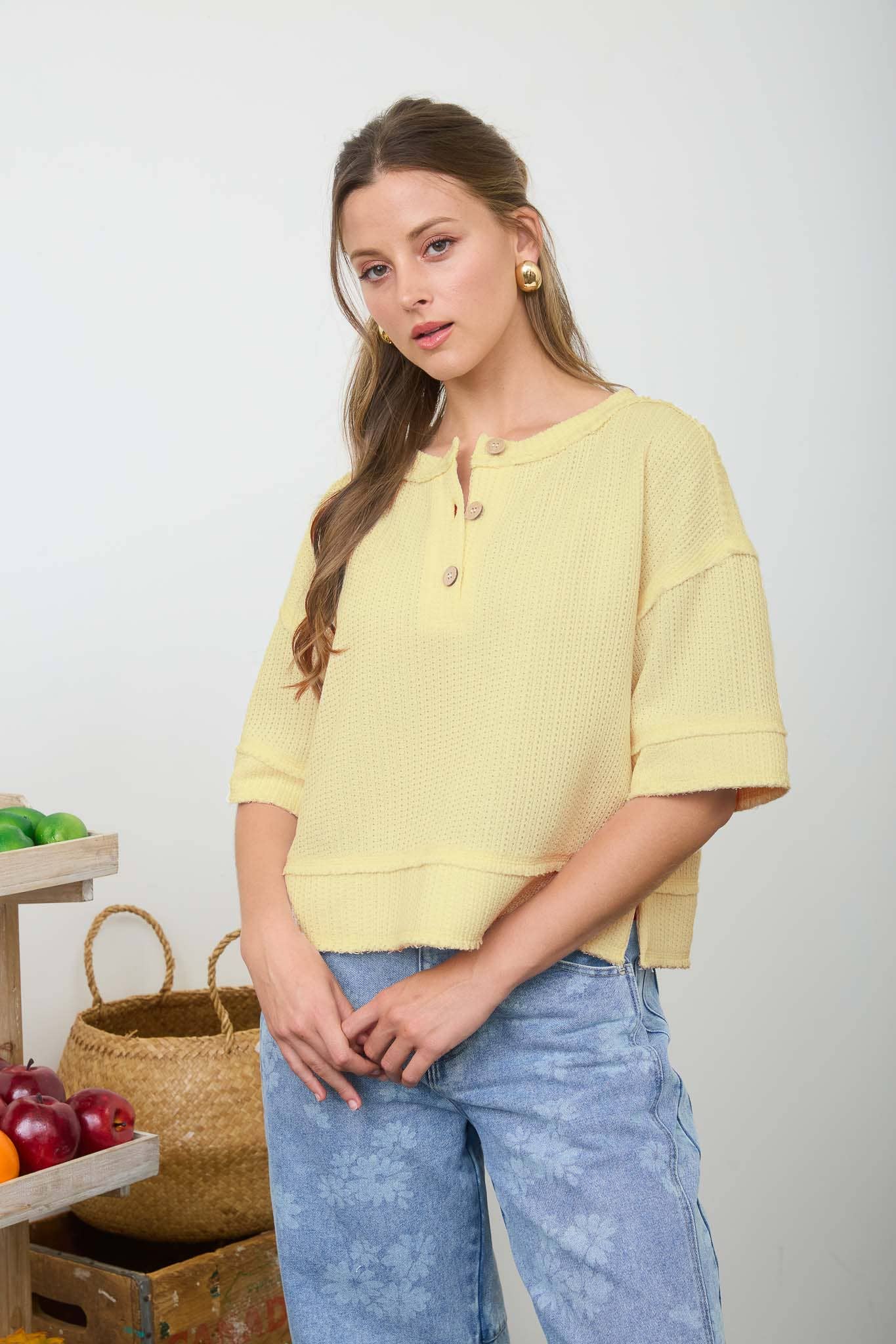 RAW EDGE HENLEY SHORT SLEEVE WAFFLE KNIT TOP
